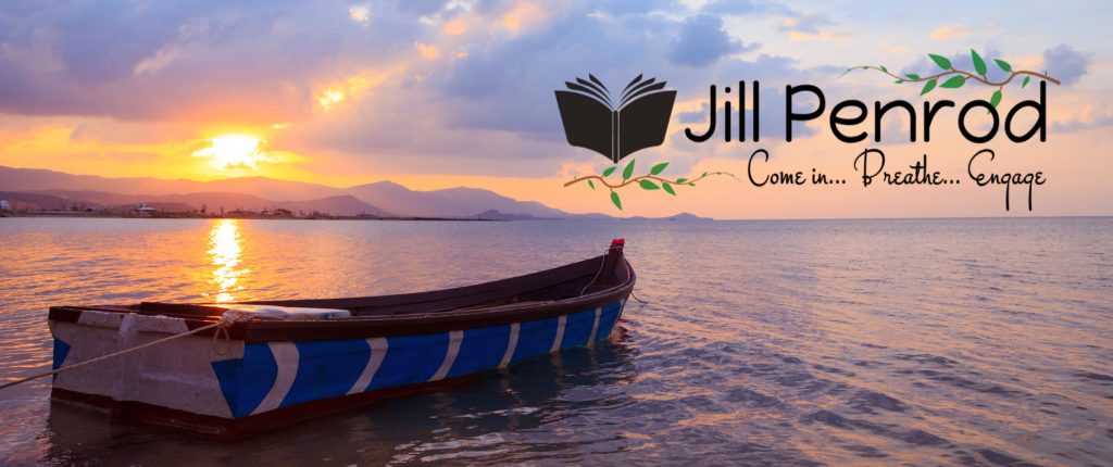 Boat at sunset with Jill Penrod logo